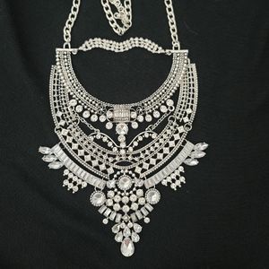 Silver with crystals intricate design necklace